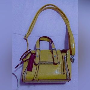 Yellow small hand bag never worn with tag purse